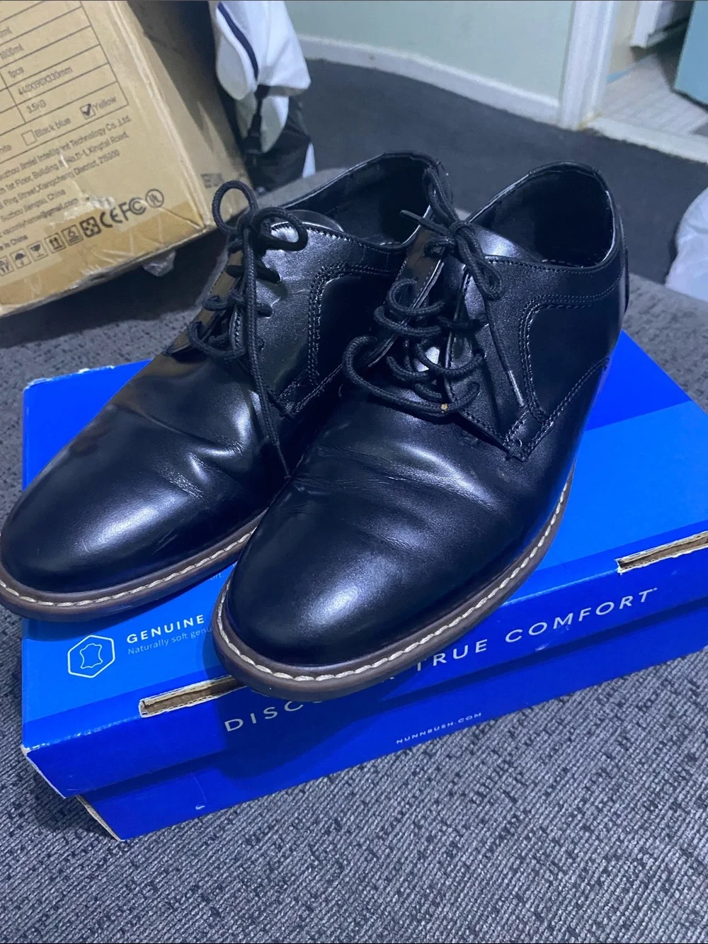 Nunn Bush Black Leather Derby Shoes with Tan Welt